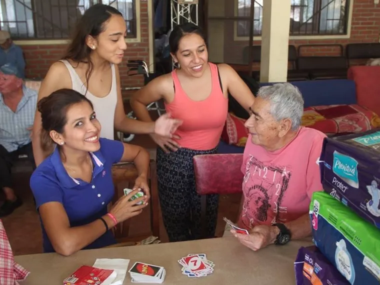 Volunteers visiting a patient
