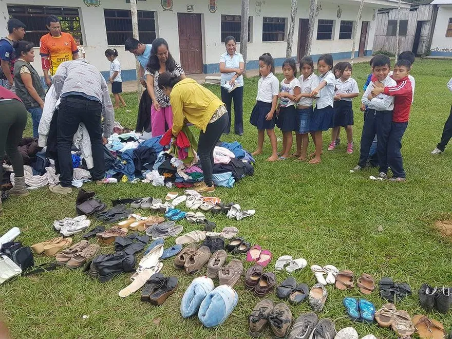 Sorting donated shoes